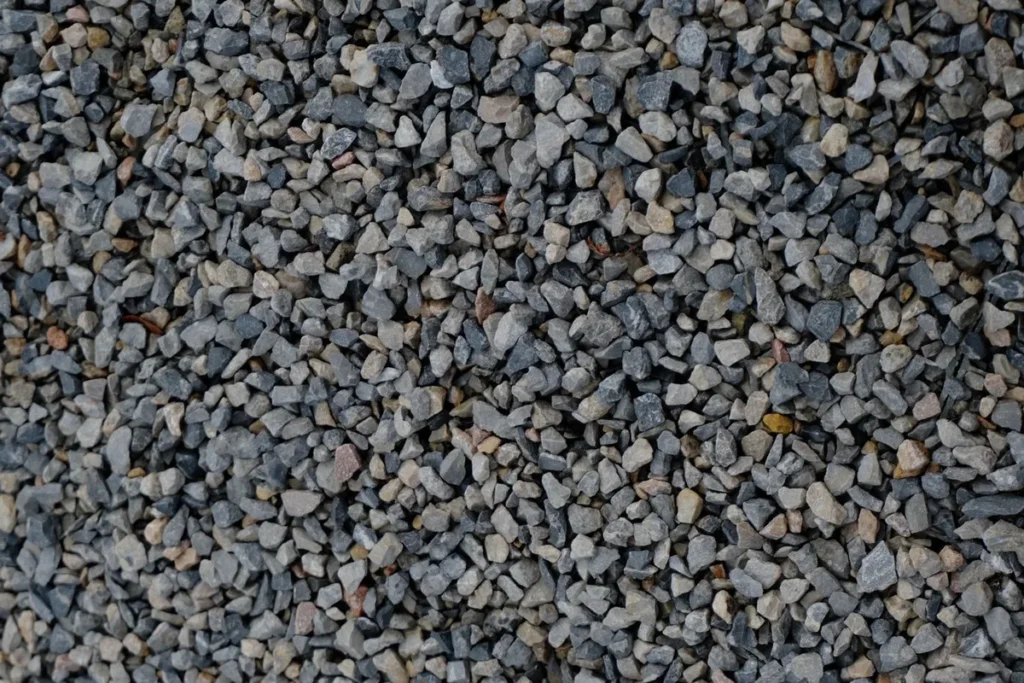 Close-up of crushed aggregate used to build a compacted, free-draining base